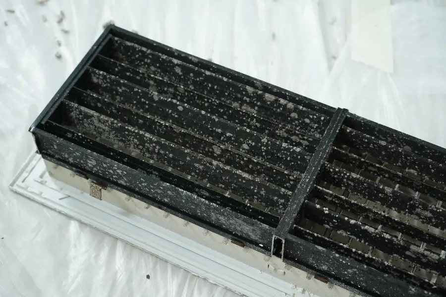 Return grille caked with dust